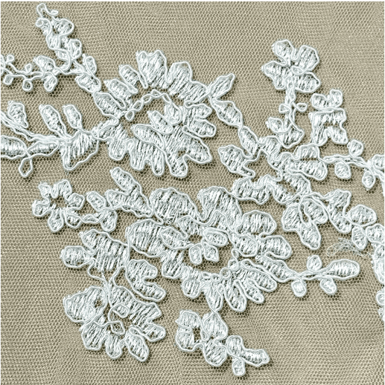 Close up of fine floral embroidery on sheer bridal tulle