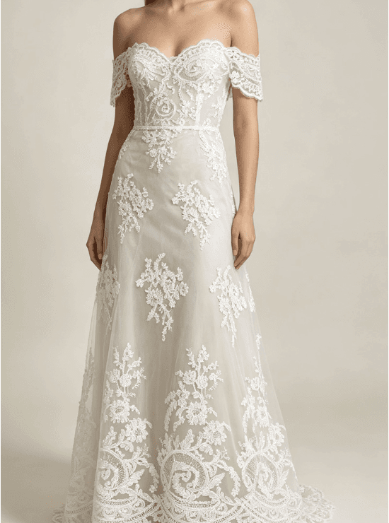 Fine embroidered tulle bridal lace on an off shoulder wedding gown
