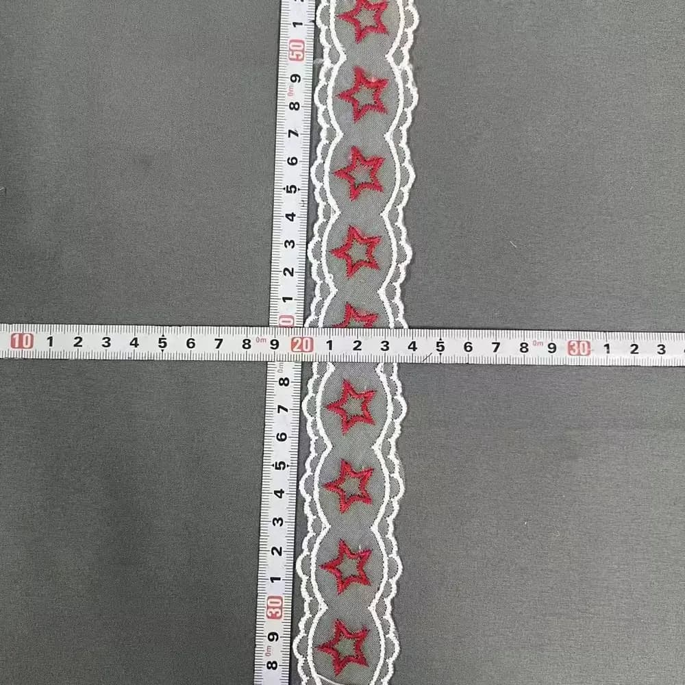 Red star embroidered lace trim with decorative white border