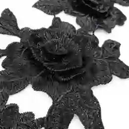 black 3D embroidered rose lace applique close-up with layered petals